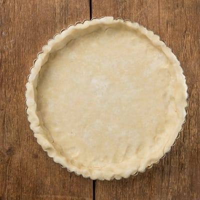 Crust pressed into the tart pan